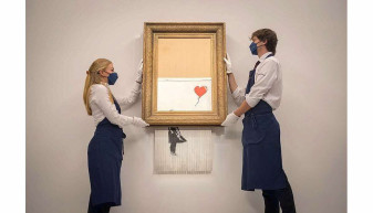 Un tablou al lui Banksy pe jumătate distrus - Vândut cu 22 milioane de euro